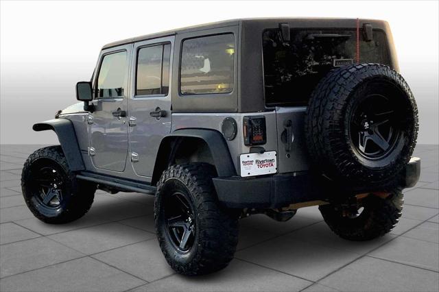 used 2013 Jeep Wrangler Unlimited car, priced at $16,745