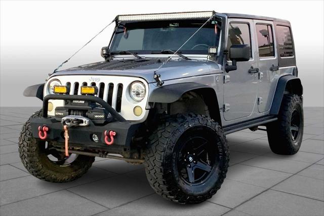 used 2013 Jeep Wrangler Unlimited car, priced at $16,745