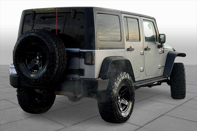 used 2013 Jeep Wrangler Unlimited car, priced at $16,745