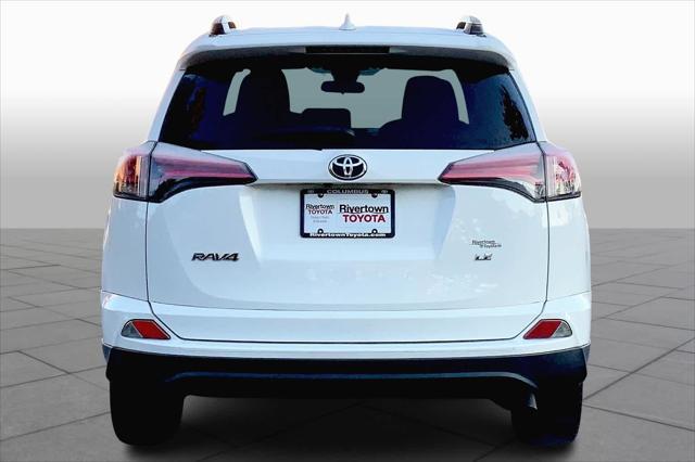 used 2018 Toyota RAV4 car, priced at $17,000