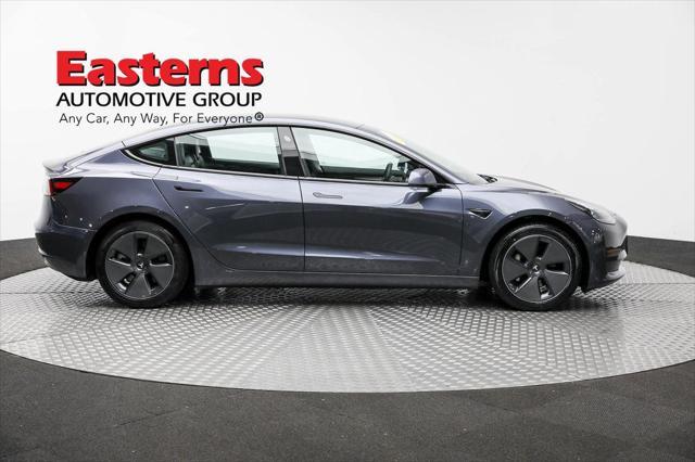 used 2022 Tesla Model 3 car, priced at $27,850