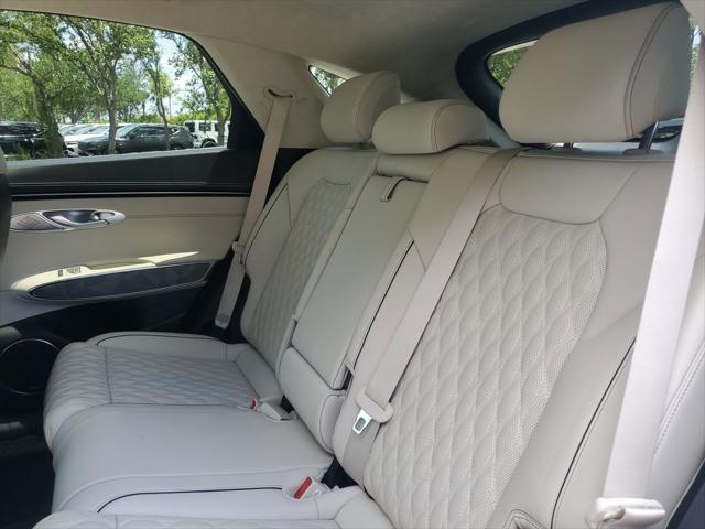 used 2025 Genesis GV70 car, priced at $56,997