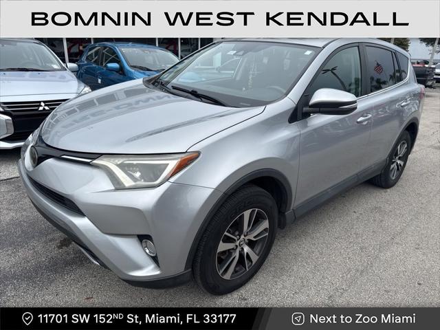 used 2018 Toyota RAV4 car, priced at $17,990