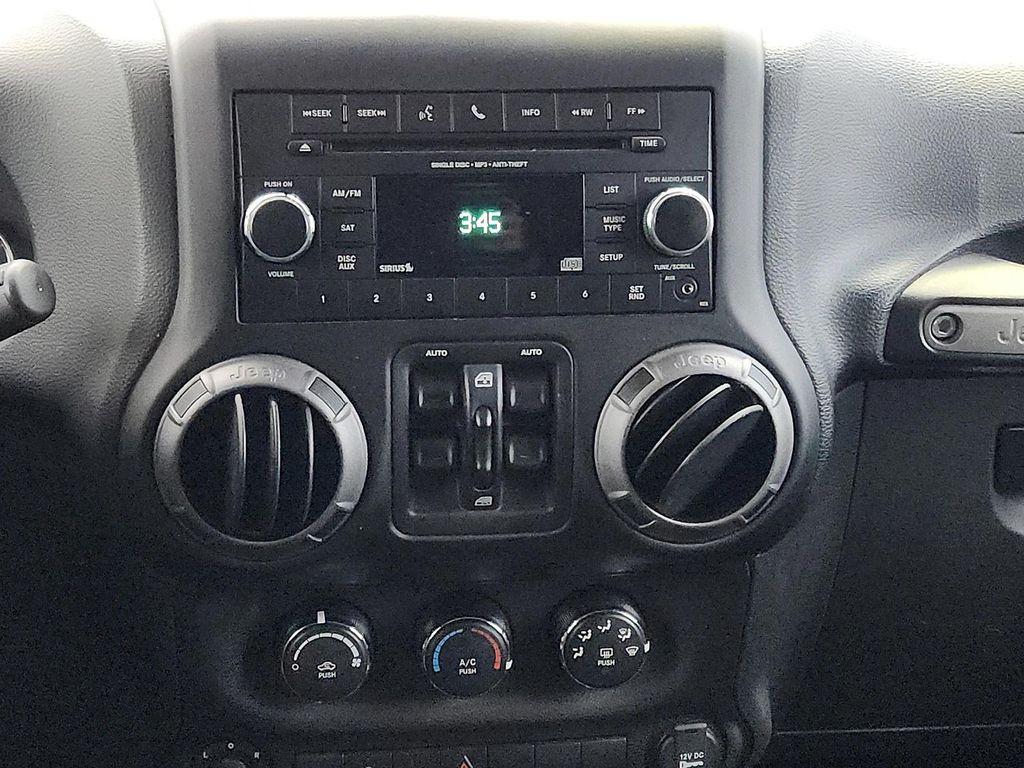 used 2018 Jeep Wrangler JK Unlimited car, priced at $21,778