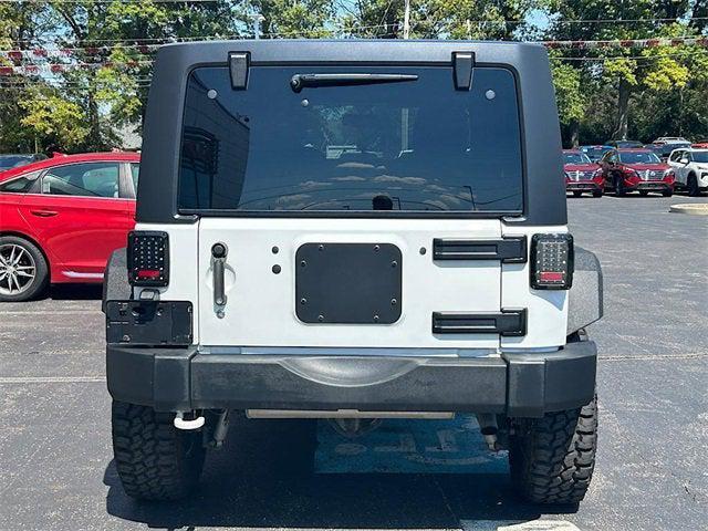 used 2018 Jeep Wrangler JK Unlimited car, priced at $23,990