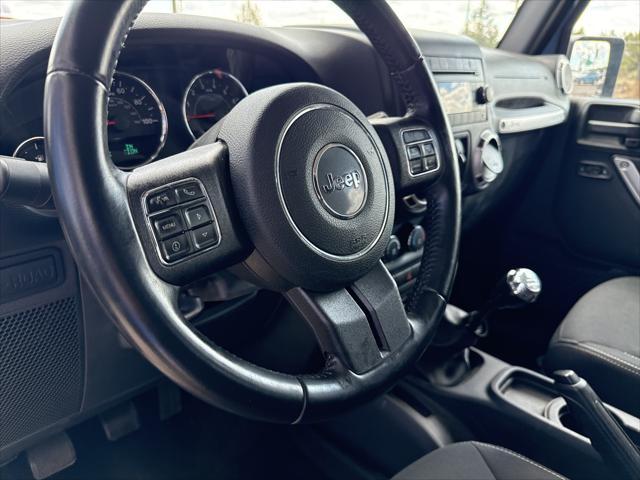 used 2016 Jeep Wrangler Unlimited car, priced at $25,990