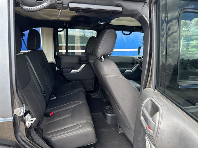 used 2016 Jeep Wrangler Unlimited car, priced at $25,990