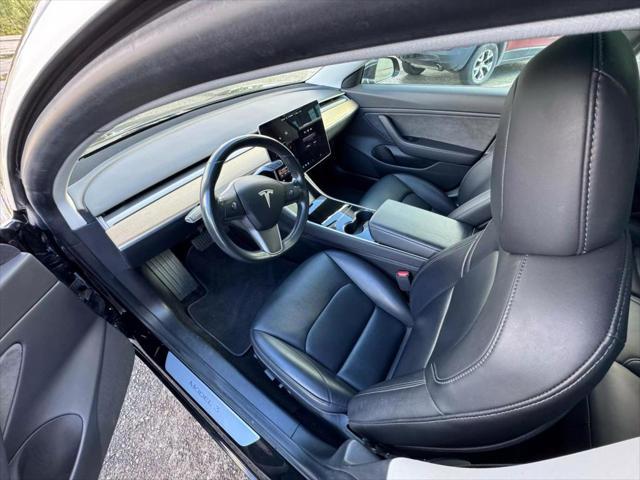 used 2018 Tesla Model 3 car, priced at $15,999