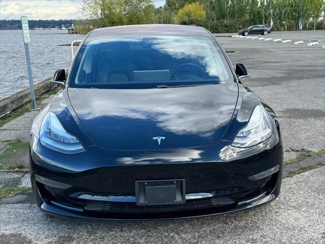 used 2018 Tesla Model 3 car, priced at $15,999