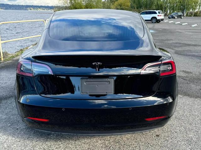 used 2018 Tesla Model 3 car, priced at $15,999