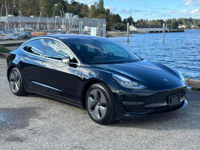 used 2018 Tesla Model 3 car, priced at $15,999