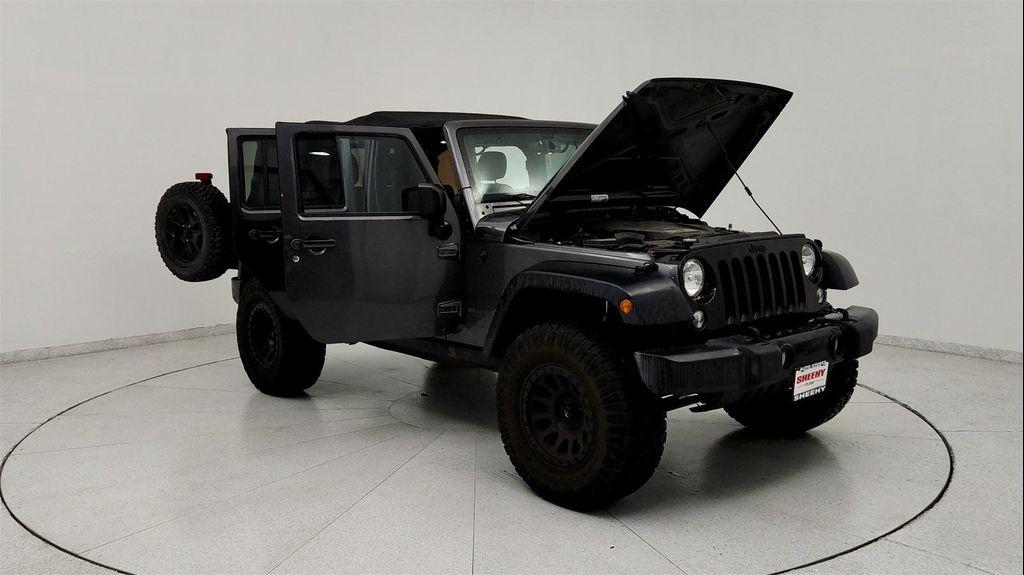 used 2017 Jeep Wrangler Unlimited car, priced at $19,491