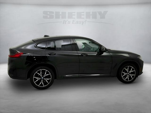 used 2023 BMW X4 car, priced at $40,591