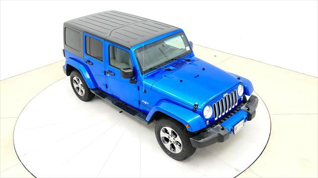 used 2016 Jeep Wrangler Unlimited car, priced at $22,991