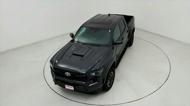 used 2024 Toyota Tacoma car, priced at $40,291