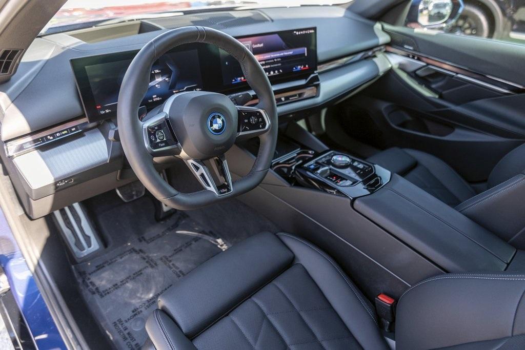 used 2024 BMW i5 car, priced at $58,900