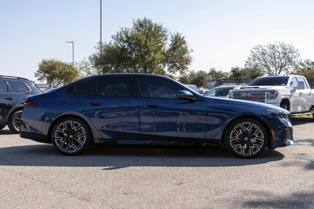 used 2024 BMW i5 car, priced at $58,900