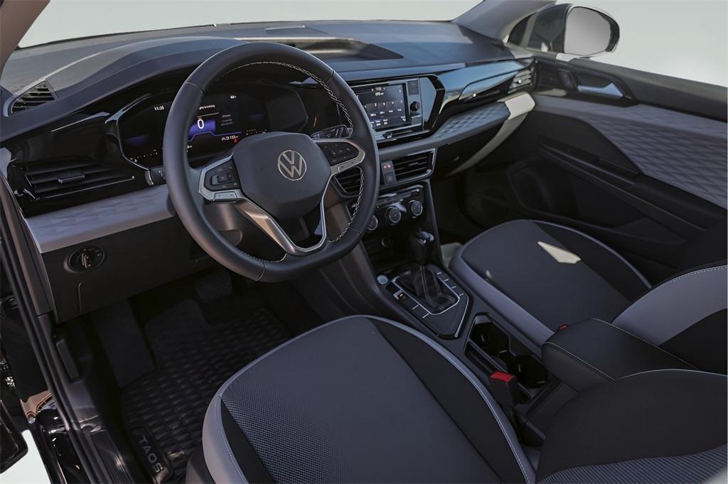 used 2023 Volkswagen Taos car, priced at $22,500