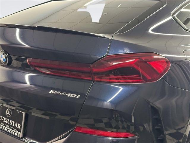 used 2023 BMW X6 car, priced at $48,117