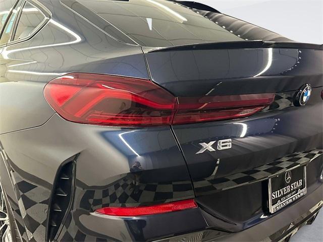 used 2023 BMW X6 car, priced at $48,117