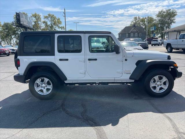 used 2021 Jeep Wrangler Unlimited car, priced at $31,952