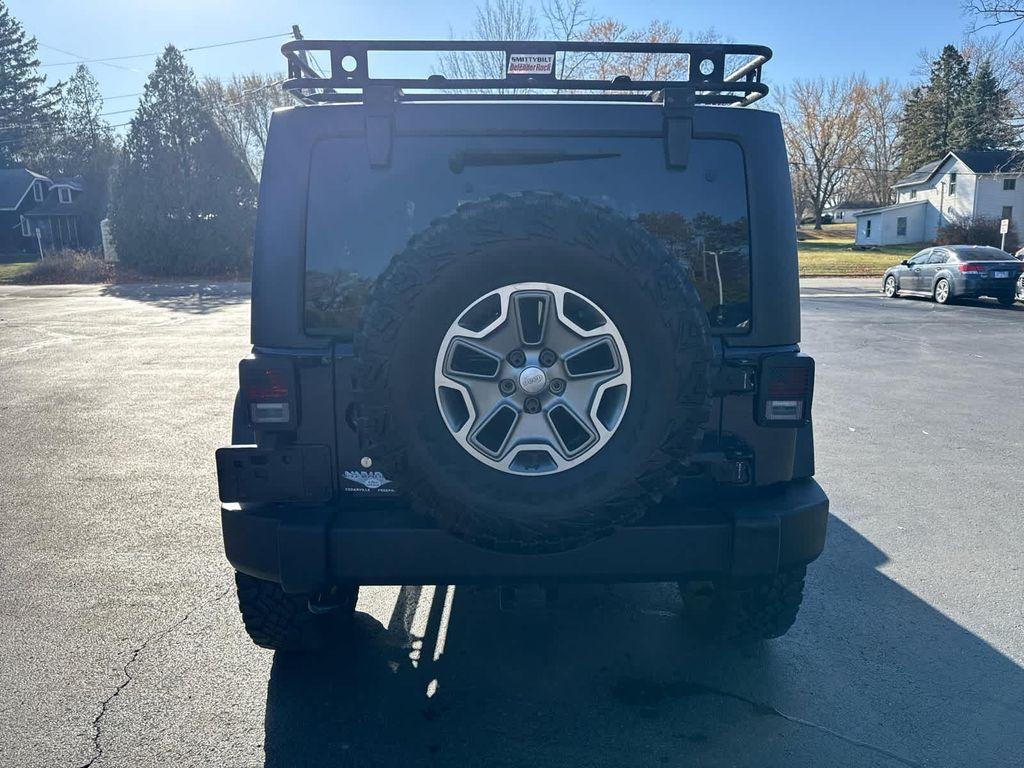 used 2013 Jeep Wrangler Unlimited car, priced at $17,952