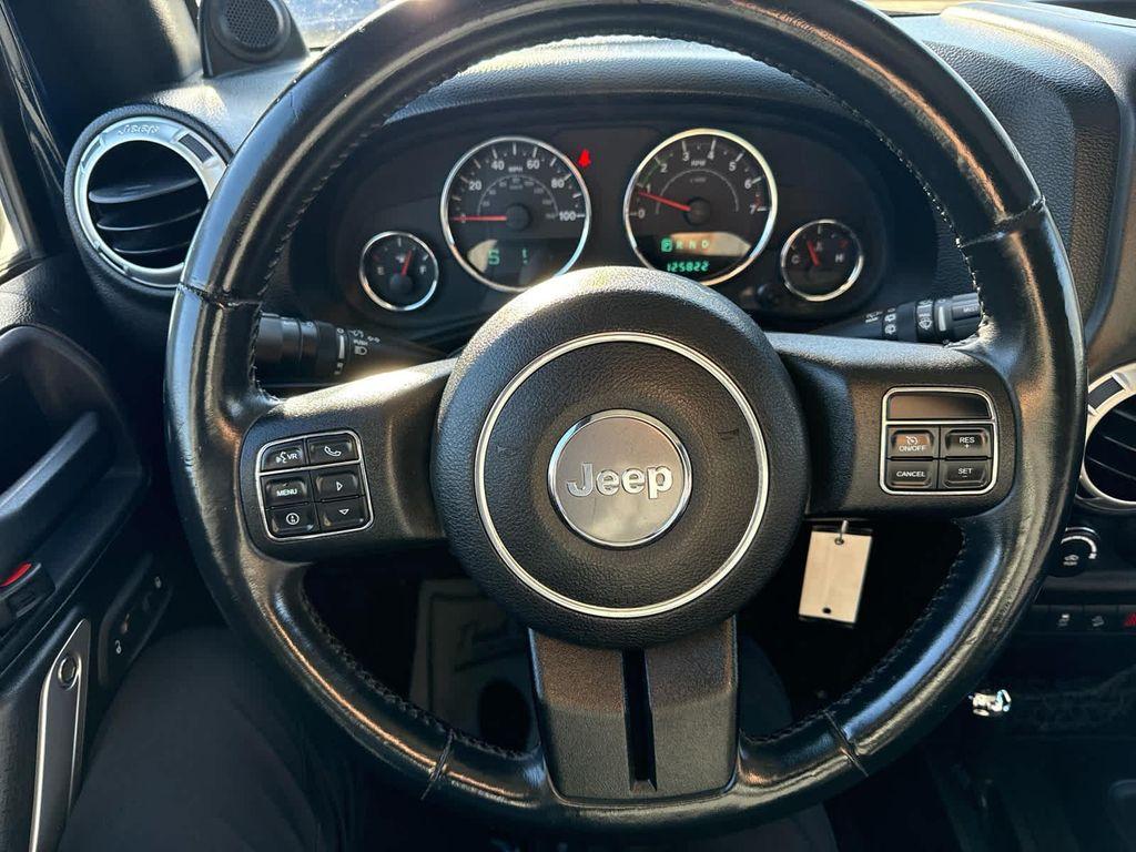 used 2013 Jeep Wrangler Unlimited car, priced at $17,952