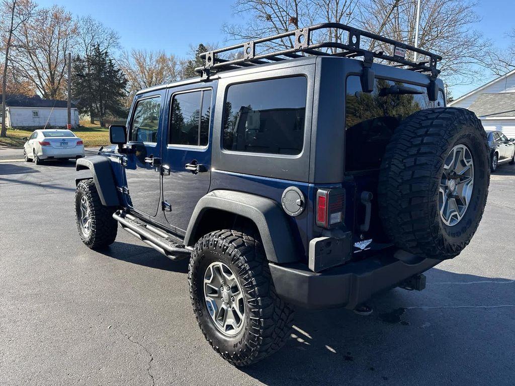 used 2013 Jeep Wrangler Unlimited car, priced at $17,952
