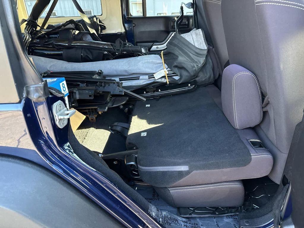 used 2013 Jeep Wrangler Unlimited car, priced at $17,952