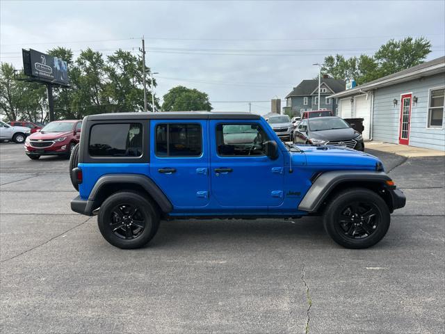 used 2021 Jeep Wrangler Unlimited car, priced at $33,952