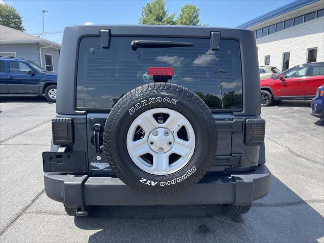 used 2018 Jeep Wrangler JK car, priced at $17,952