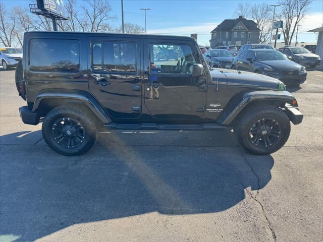 used 2015 Jeep Wrangler Unlimited car, priced at $17,952