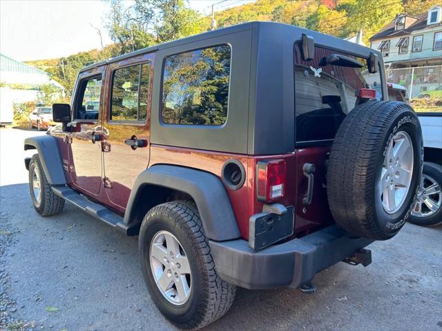 used 2010 Jeep Wrangler Unlimited car, priced at $9,950