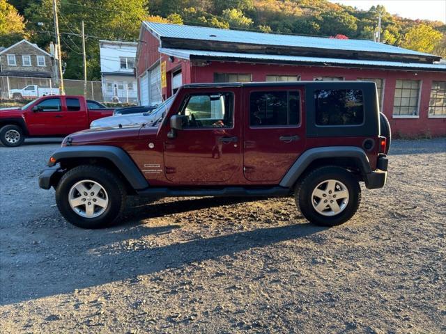 used 2010 Jeep Wrangler Unlimited car, priced at $9,950