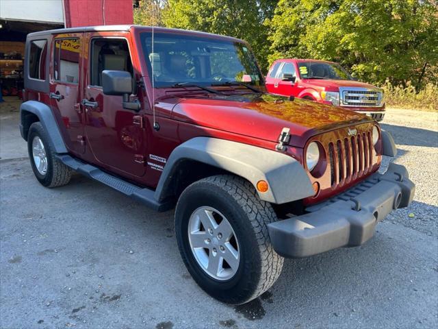 used 2010 Jeep Wrangler Unlimited car, priced at $9,950