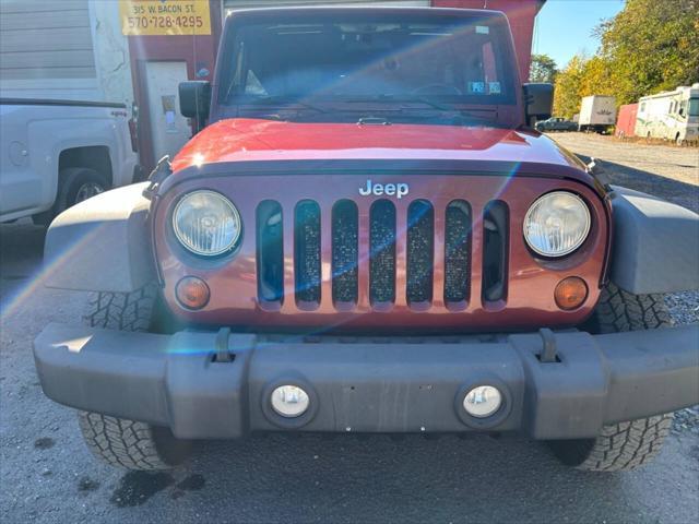 used 2010 Jeep Wrangler Unlimited car, priced at $9,950