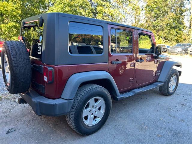 used 2010 Jeep Wrangler Unlimited car, priced at $9,950