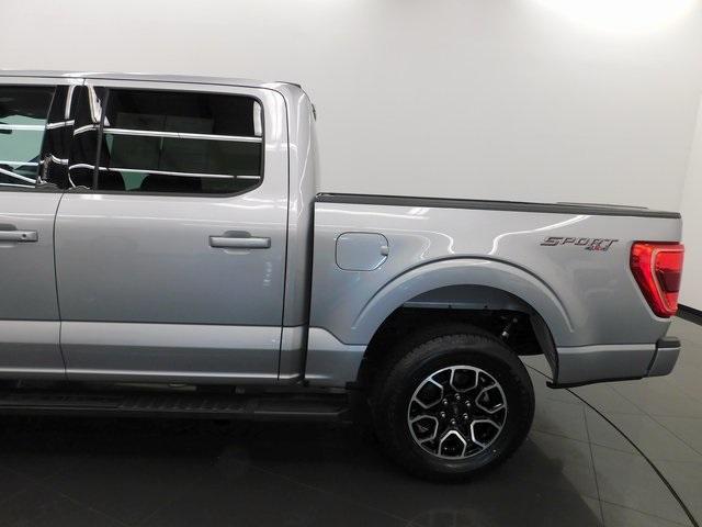 used 2023 Ford F-150 car, priced at $43,877