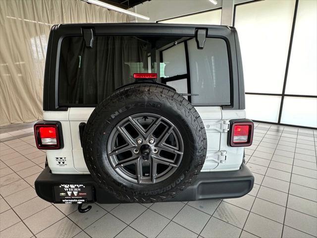 used 2024 Jeep Wrangler car, priced at $35,522