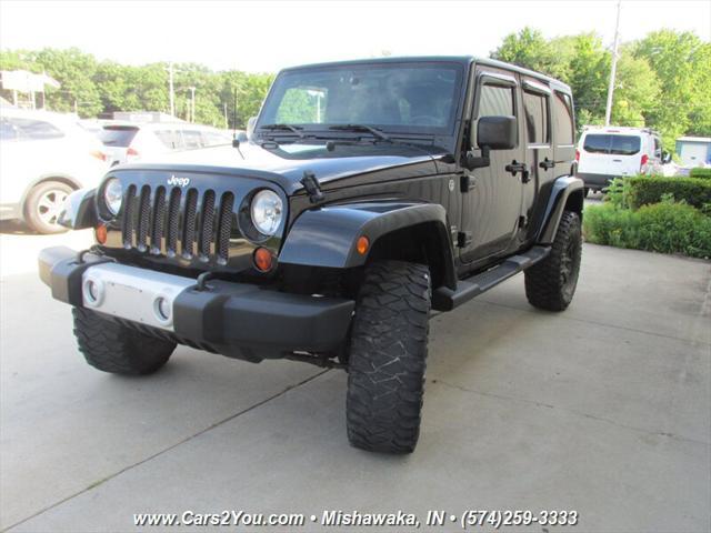 used 2011 Jeep Wrangler Unlimited car, priced at $15,995