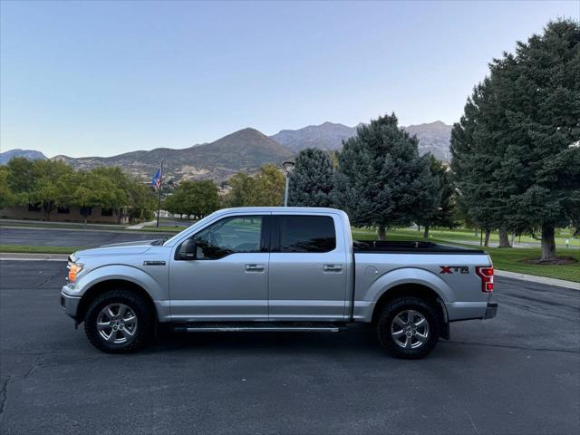 used 2018 Ford F-150 car, priced at $18,000