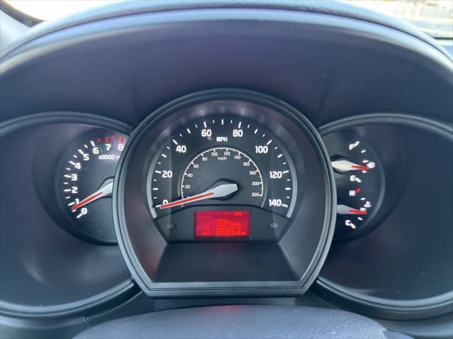 used 2014 Kia Rio car, priced at $5,000