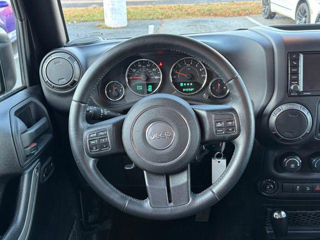 used 2016 Jeep Wrangler Unlimited car, priced at $19,523