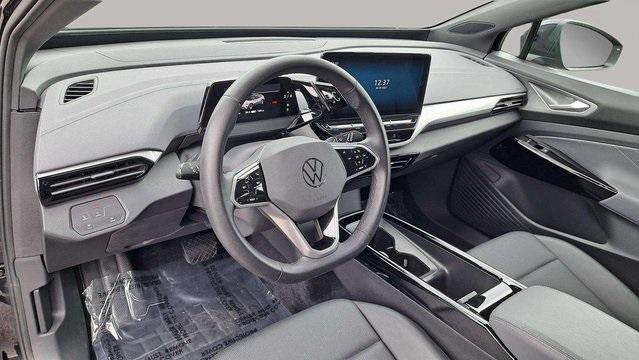 used 2023 Volkswagen ID.4 car, priced at $21,555