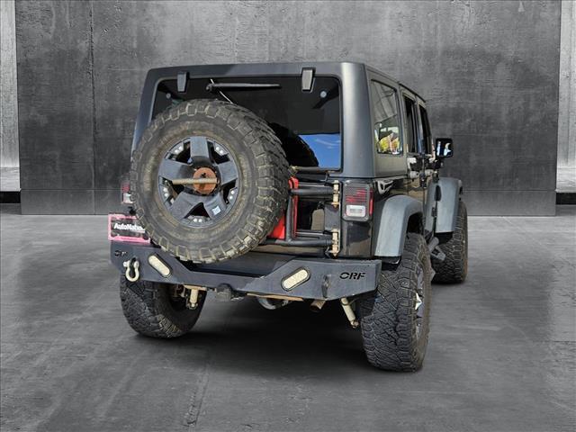 used 2014 Jeep Wrangler Unlimited car, priced at $14,985