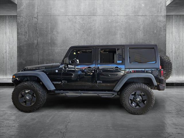 used 2014 Jeep Wrangler Unlimited car, priced at $14,985