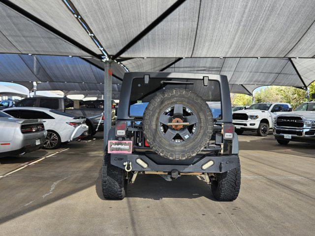 used 2014 Jeep Wrangler Unlimited car, priced at $14,985