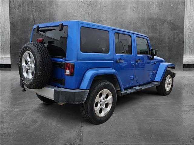 used 2015 Jeep Wrangler Unlimited car, priced at $22,684