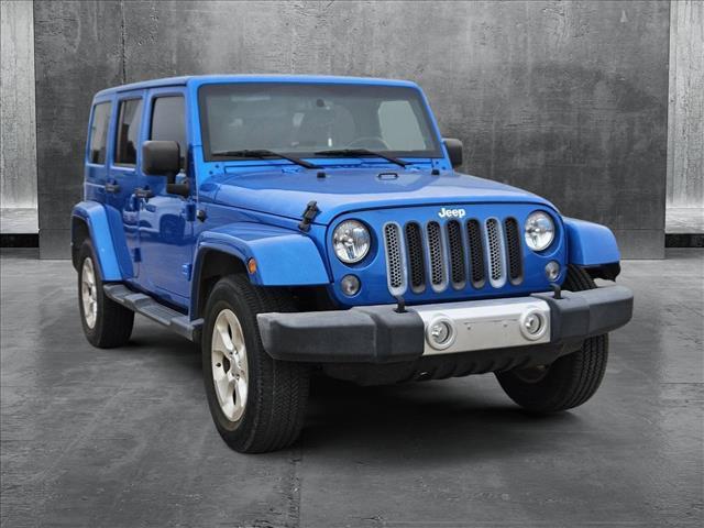 used 2015 Jeep Wrangler Unlimited car, priced at $22,684