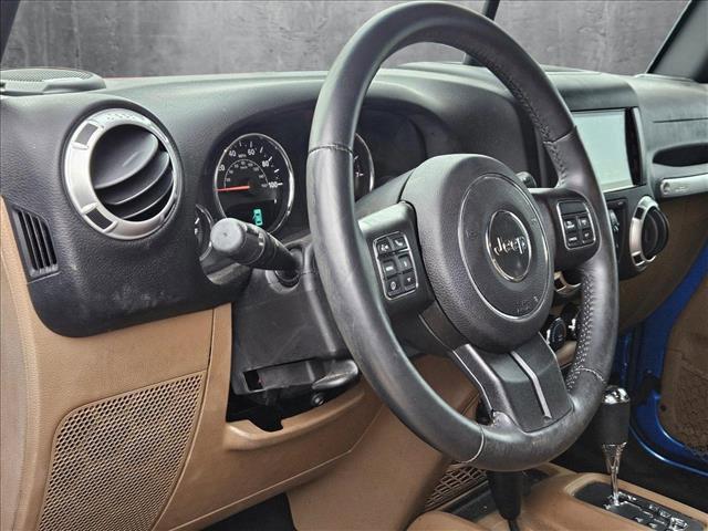 used 2015 Jeep Wrangler Unlimited car, priced at $22,684